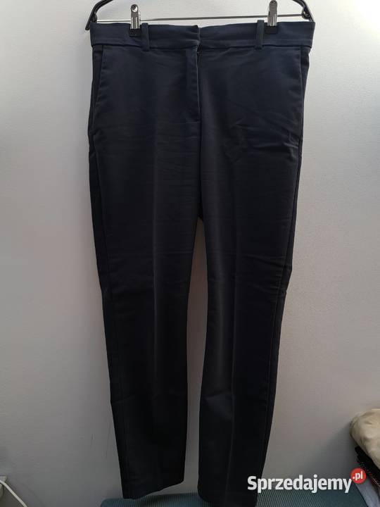 Eleganckie czarne spodnie damskie HM 42 L sprzedam