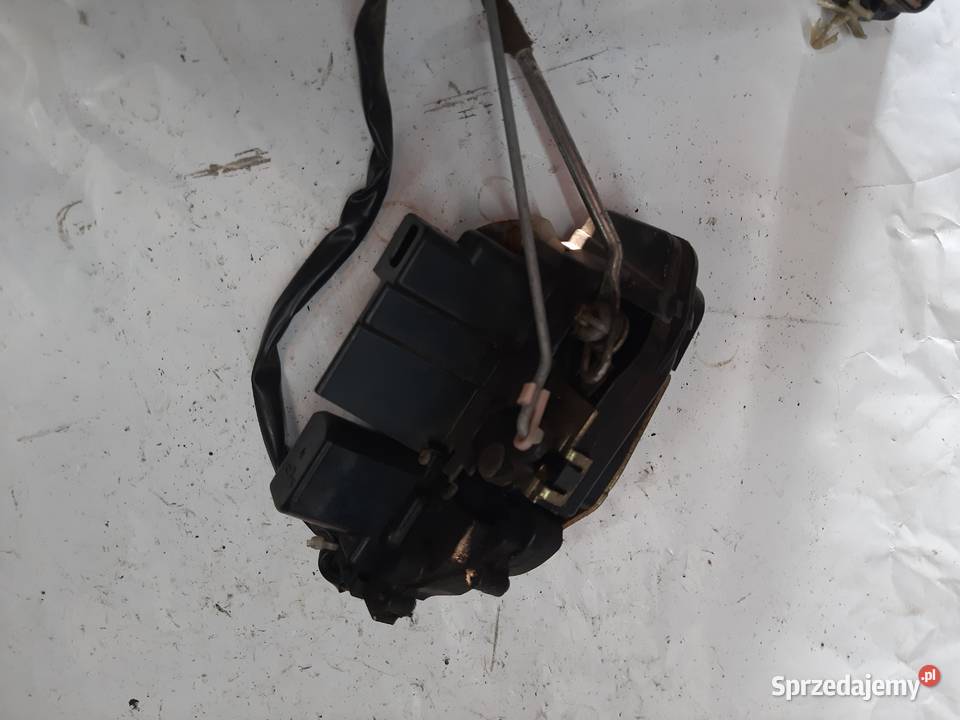 Kia Carens II Zamek Drzwi Lewy Przód Ksawerów