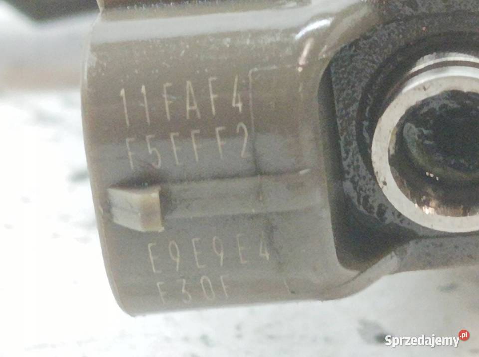 WTRYSKIWACZ 55567729 17 CDTI Opel Astra IV 2009
