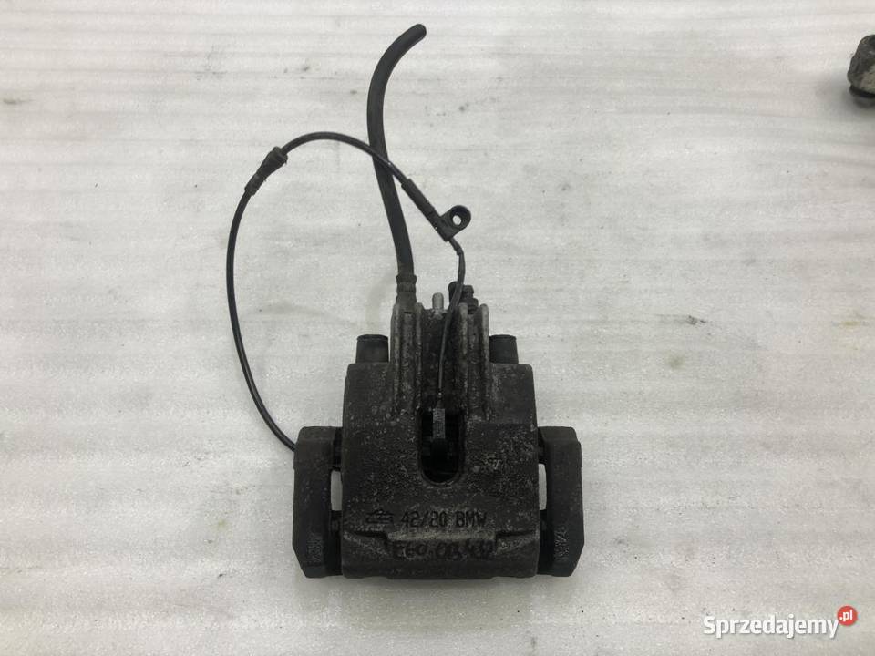 ZACISK HAMULCOWY PRAWY TYŁ BMW E60