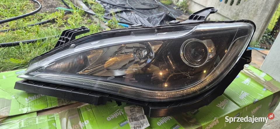 Lampa Reflektor Pacifica OE 68228947AF Lewy