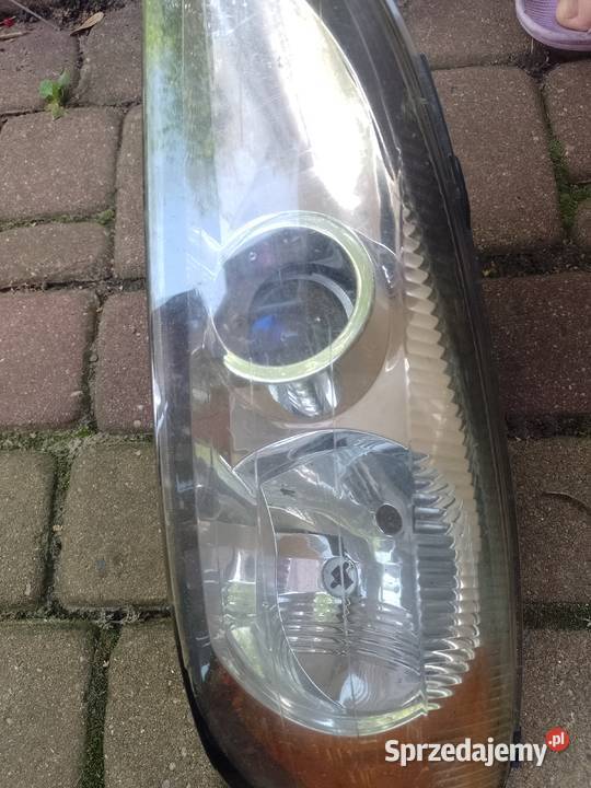 lampa lewa Nissan Primera P 11 lift 9902 uchwyty Bielsk Podlaski