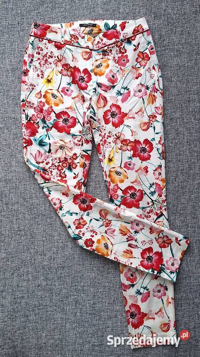 Eleganckie spodnie damskie w kwiaty r XS Darłowo