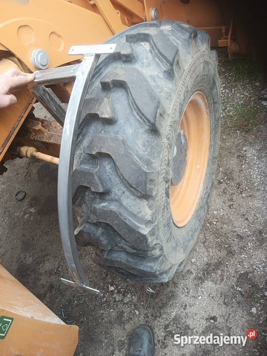 Uchwyty pod nadkola koparko ładowarki case cat Koparko ładowarki