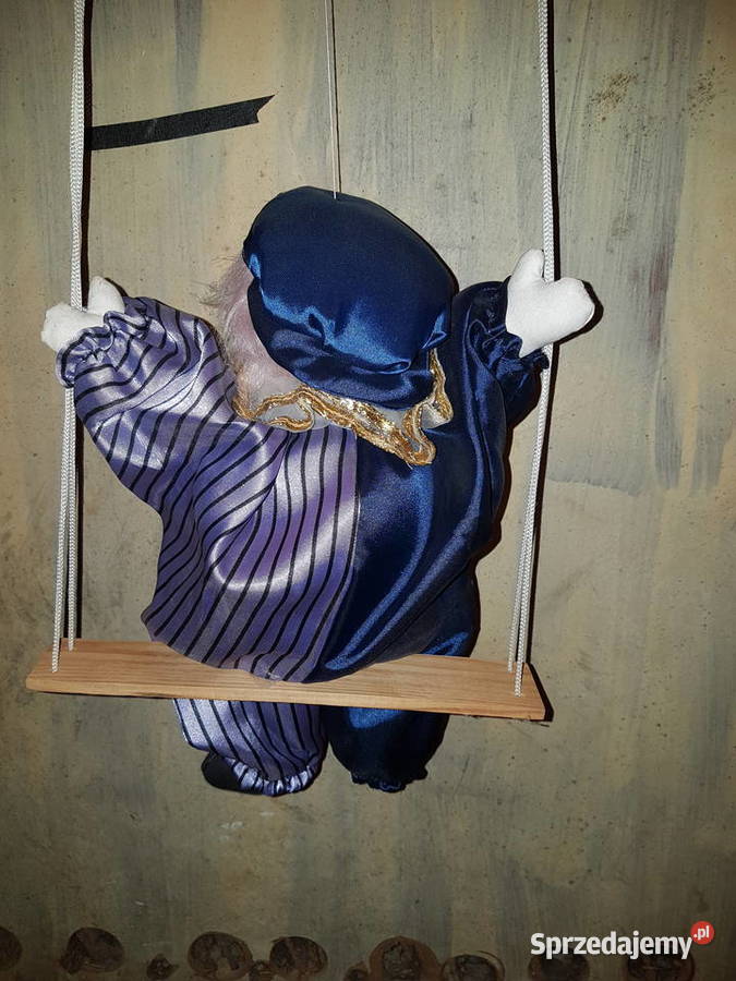 Pajacyk na chustawce z porcelanowa głową Mielec