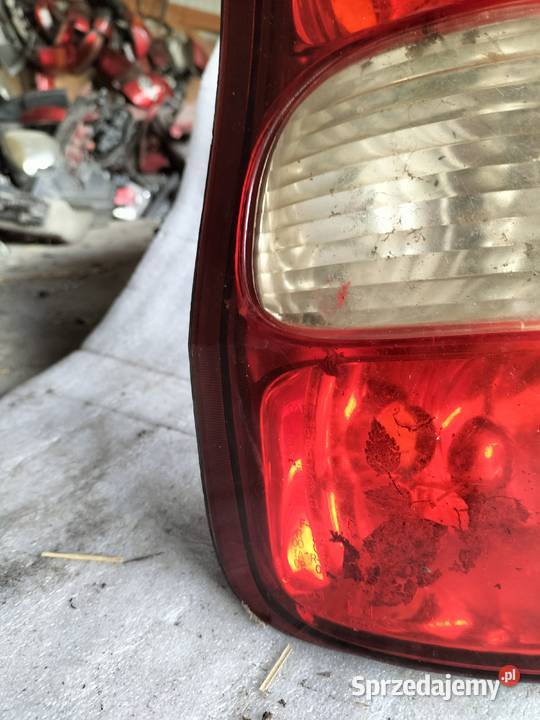 KIA CARNIVAL I LAMPA TYŁ TYLNA LEWA Lewe