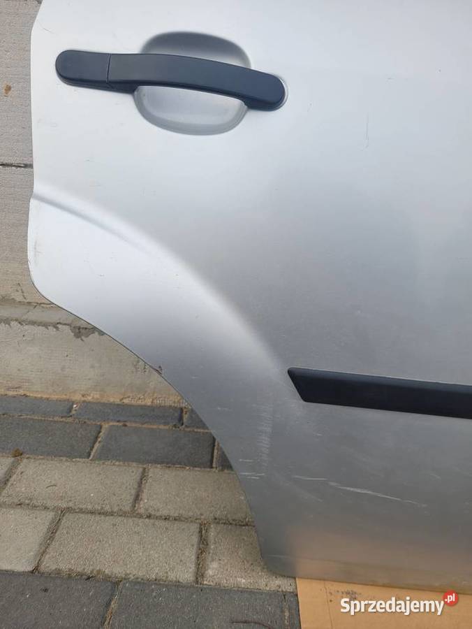 Ford Fiesta mk6 drzwi prawe tył szyba boczek Huta Dzierążyńska