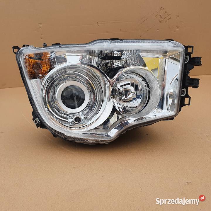 MERCEDES AROCS ANTOS REFLEKTOR LEWY XENON LAMPA Części samochodowe Bieleń