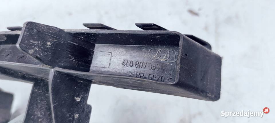 ŚLIZG UCHWYT MOCOWANIE LEWE AUDI Q7 4L0807333 osobowe śląskie Przystajń