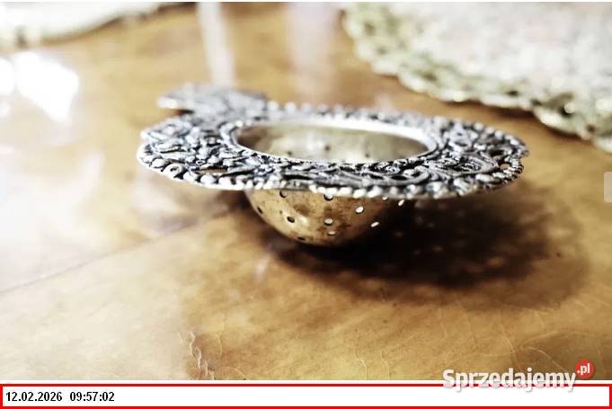 Srebrne sitko do herbaty z motywem puttów1900r dolnośląskie