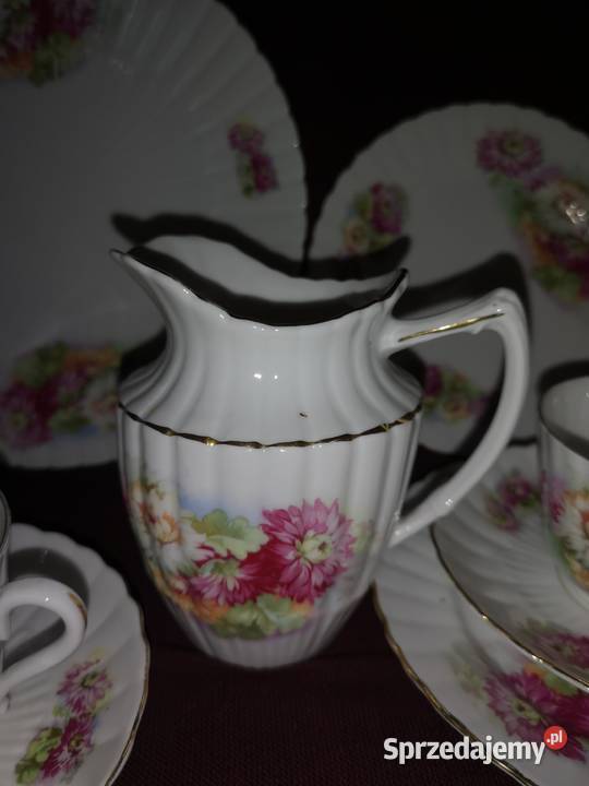 Filiżanka z talerzykiem deserowym z kwiatami syg Porcelana i szkło Gdańsk