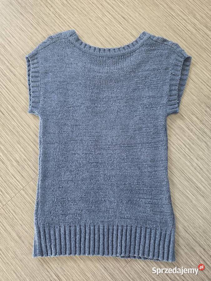 Niebieska bluzka z prześwitem Orsay