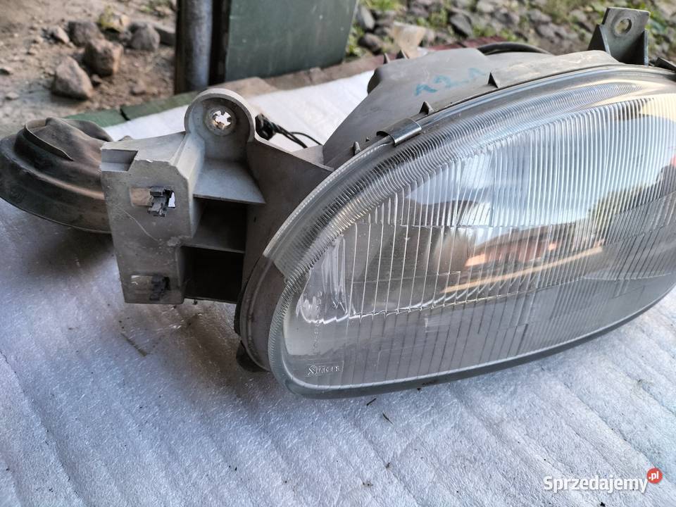 Mazda 121 LAMPA PRZÓD PRZEDNIA LEWA osobowe Motoryzacja Kamień-Kolonia