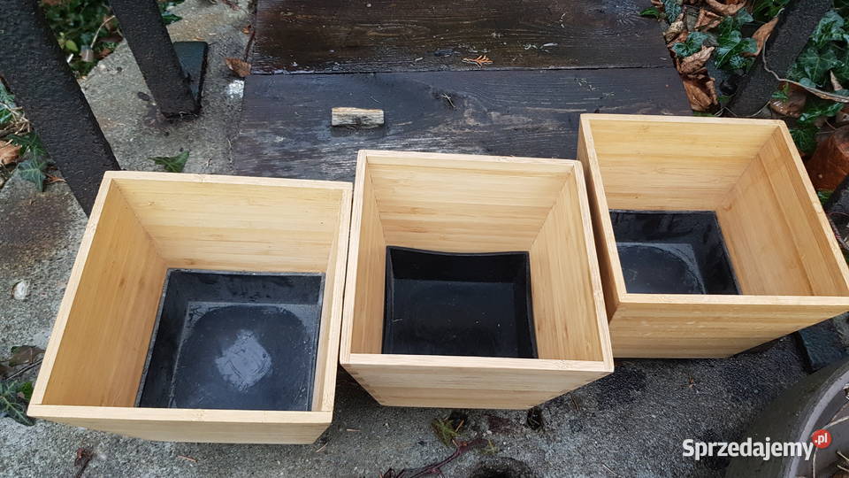 Trzy drewniane osłonki na doniczki Myszków