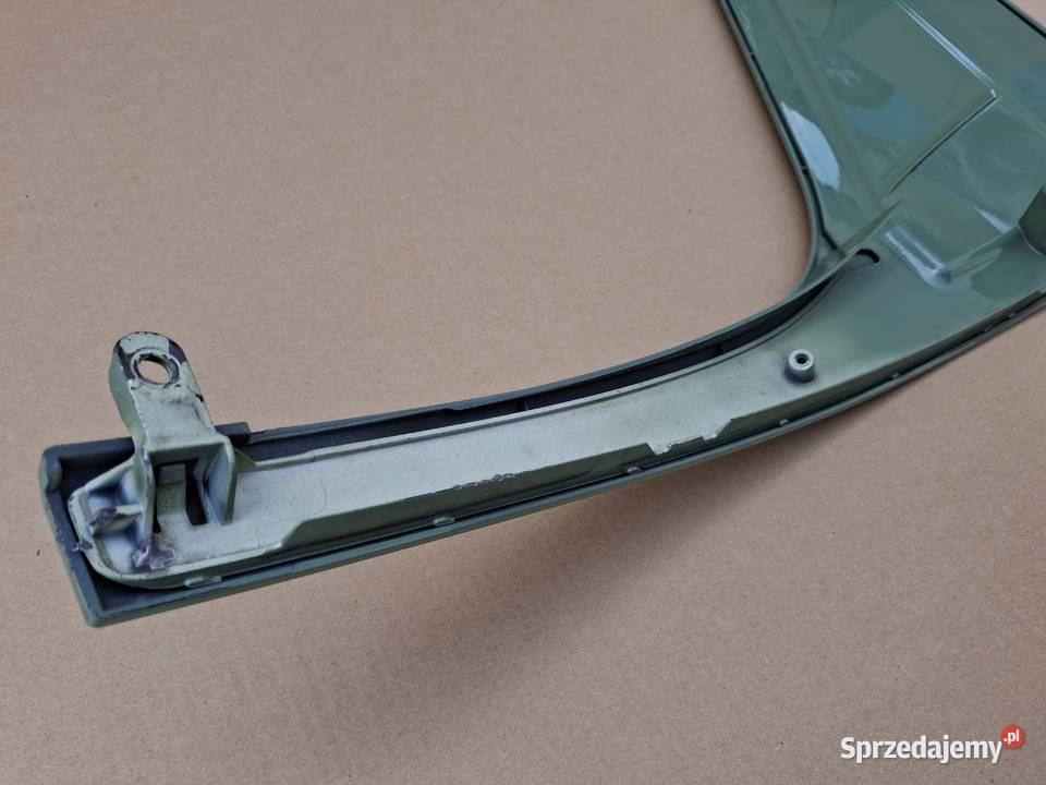 ACTROS MP4 PAMKA LISTWA OSŁONA REFLEKTORA PRAWA Bieleń