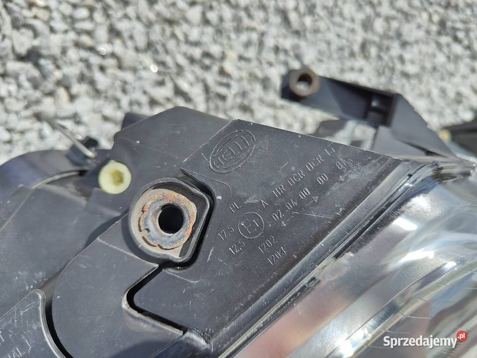 Lampy reflektory VW Passat B5 fl bi xenon Hella lampy przednie Oświetlenie Kielcza