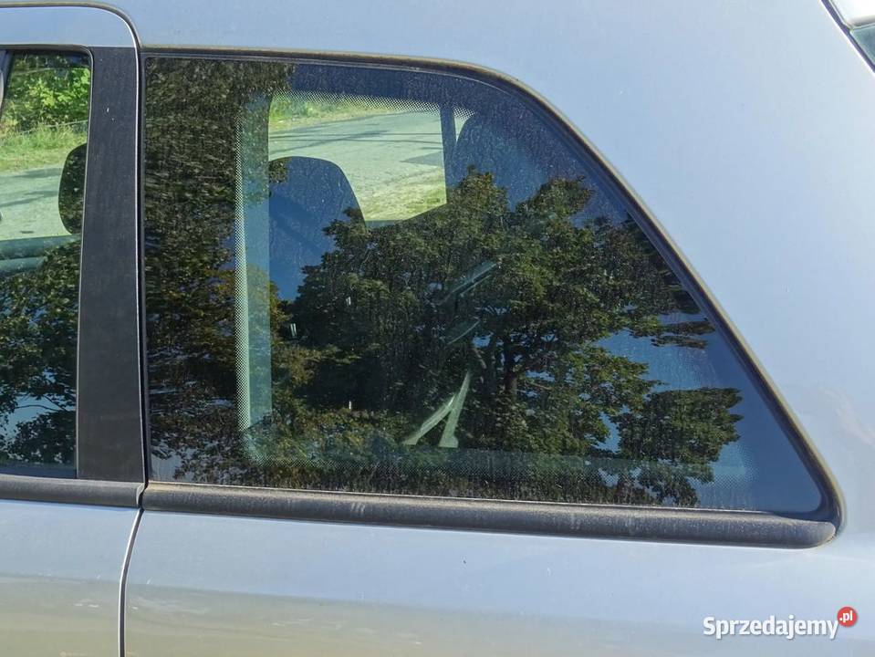 Trujkąt szyba boczna bok Zafira B Parcice