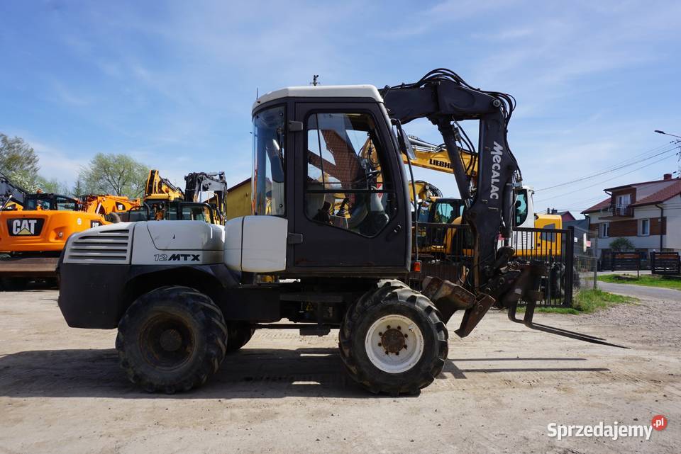 Koparka kołowa Mecalac 12 MTX 2011 Rok produkcji 2011 sprzedam