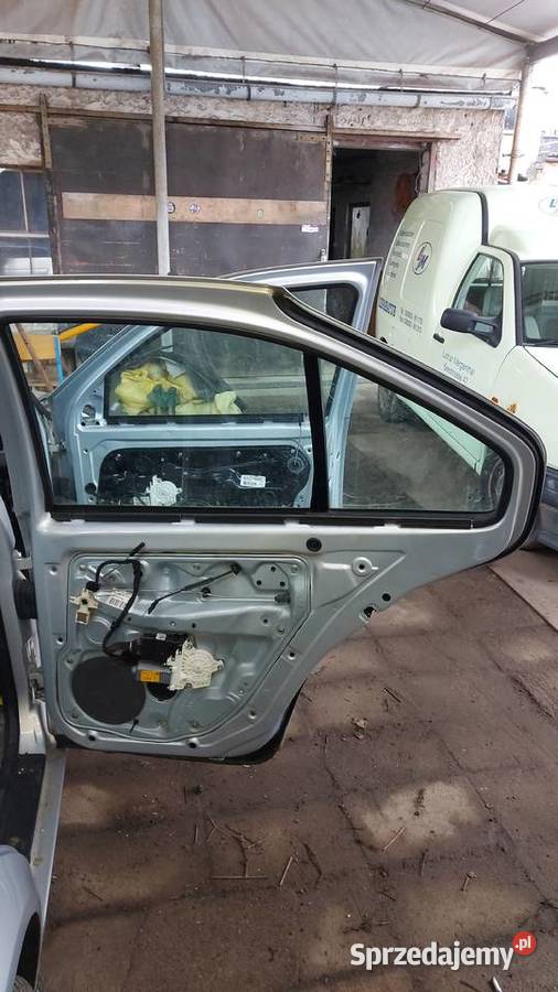 Drzwi lewe kompletne VW Bora 1999r 16 SR benz części blacharskie Poznań