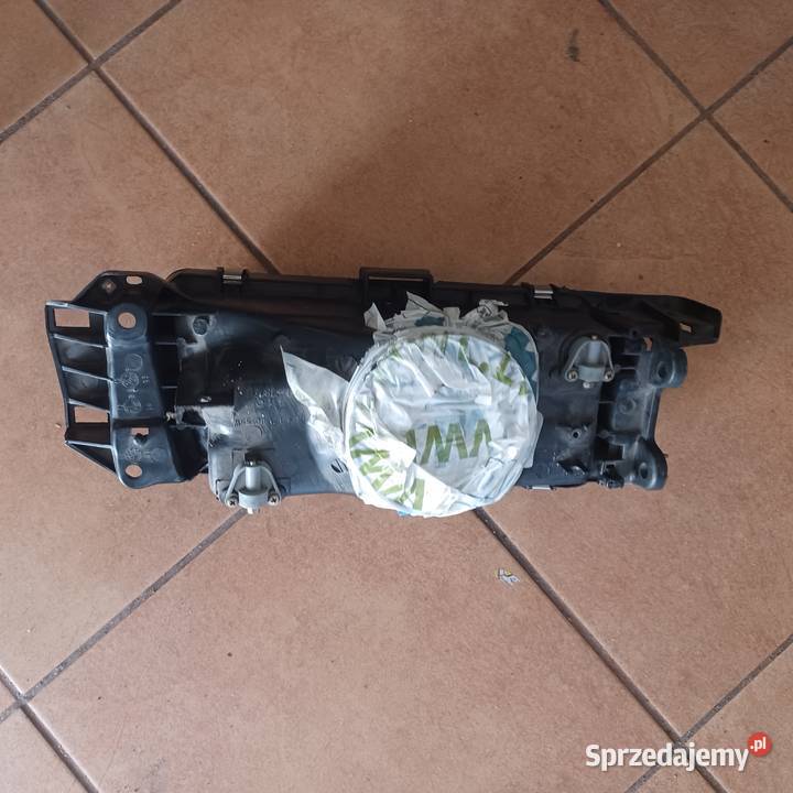 LAMPA MAZDA 323 S IV 8996 lewa