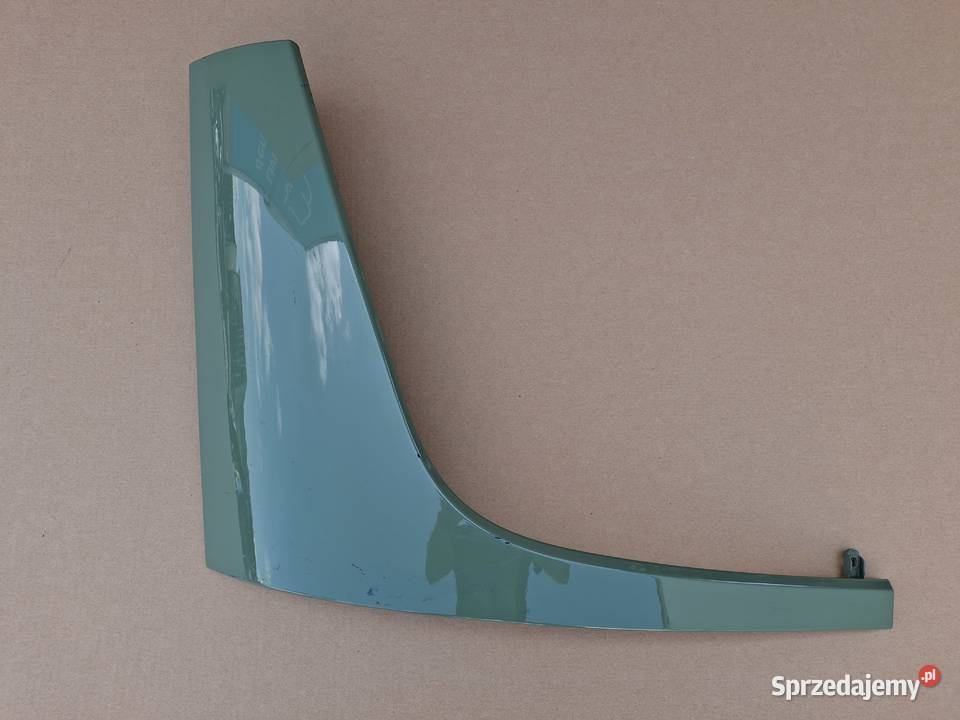 ACTROS MP4 PAMKA LISTWA OSŁONA REFLEKTORA PRAWA Bieleń