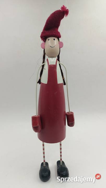 Figurka zimowej dziewczynki w czerwonym stroju
