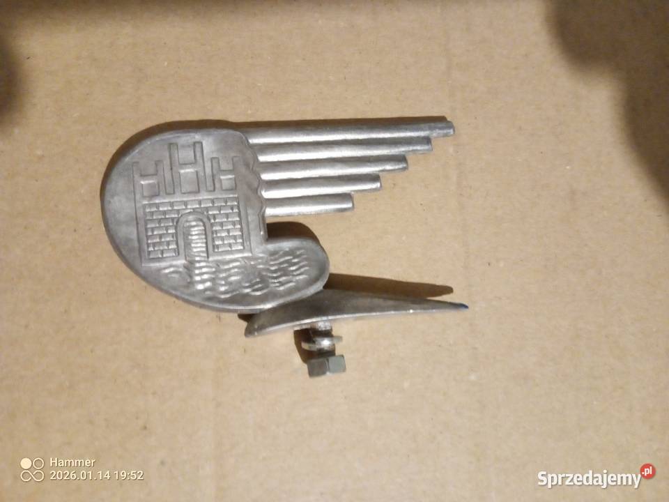 Oryginalny emblemat na błotnik HENNINGS HELMUT Ciosaniec