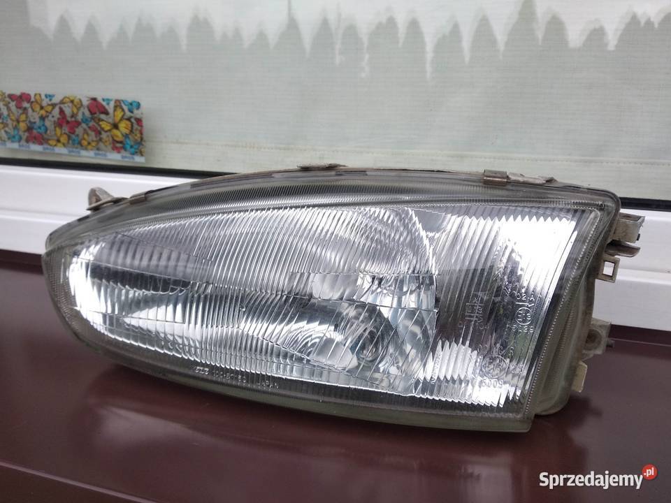 Mitsubishi Colt V CJ0 lampa przednia lewa łódzkie Sieradz