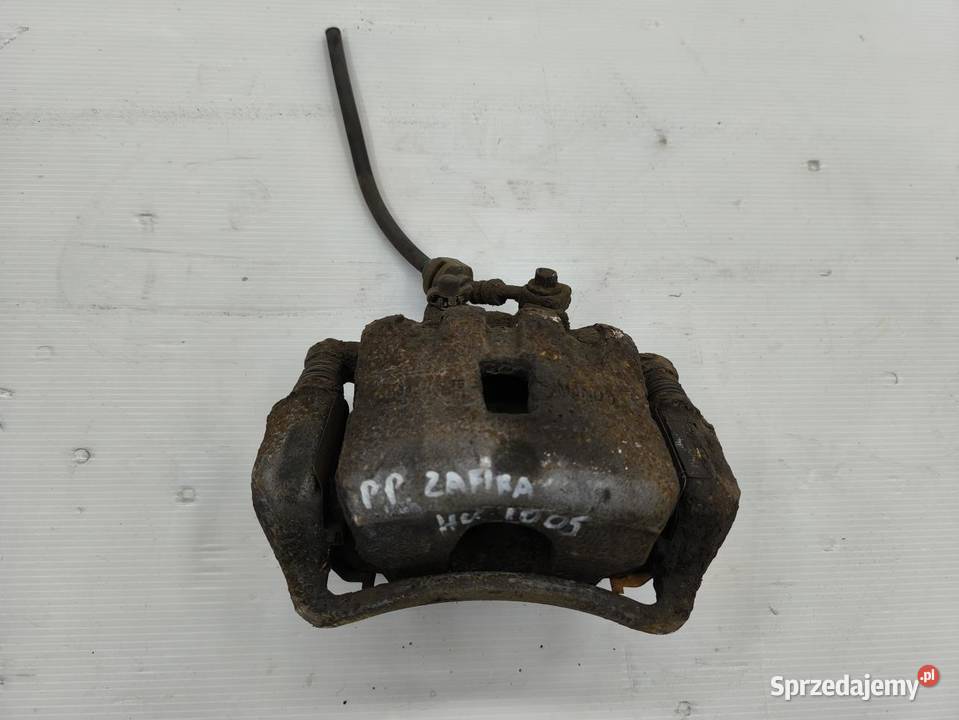 ZACISK PRAWY PRZÓD OPEL ZAFIRA C 20 CDTI