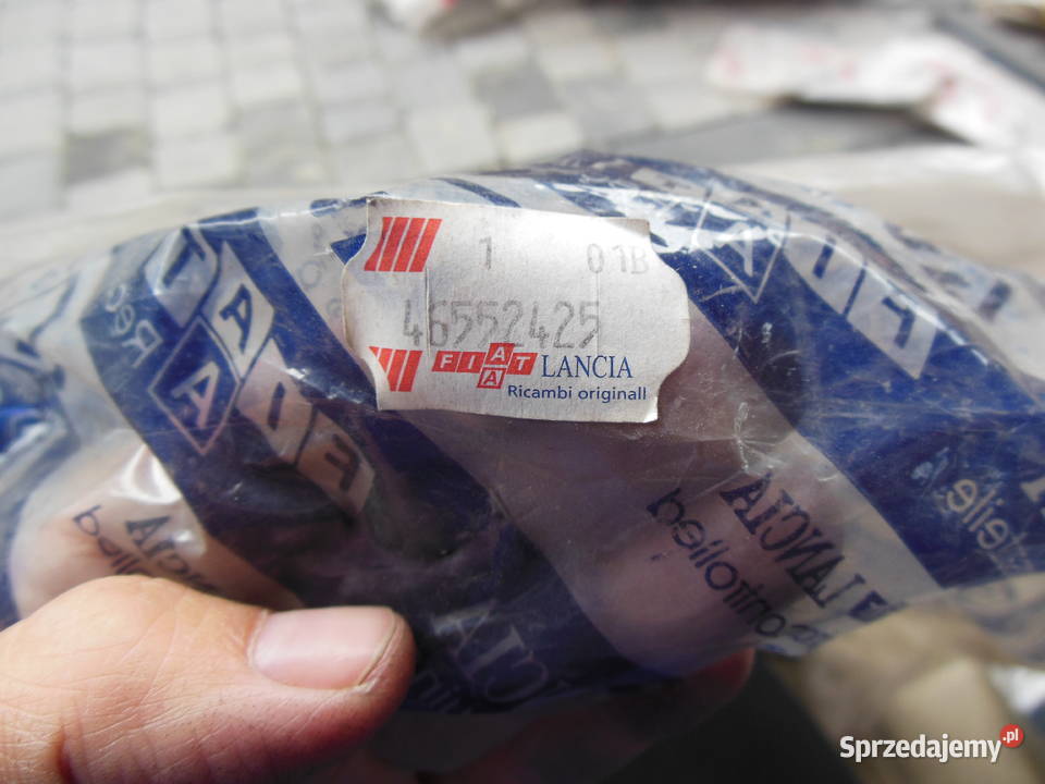 PODKŁADKA KOŁA ZAPASOWEGO PALIO SIENA 46552425 Akcesoria samochodowe Kozy