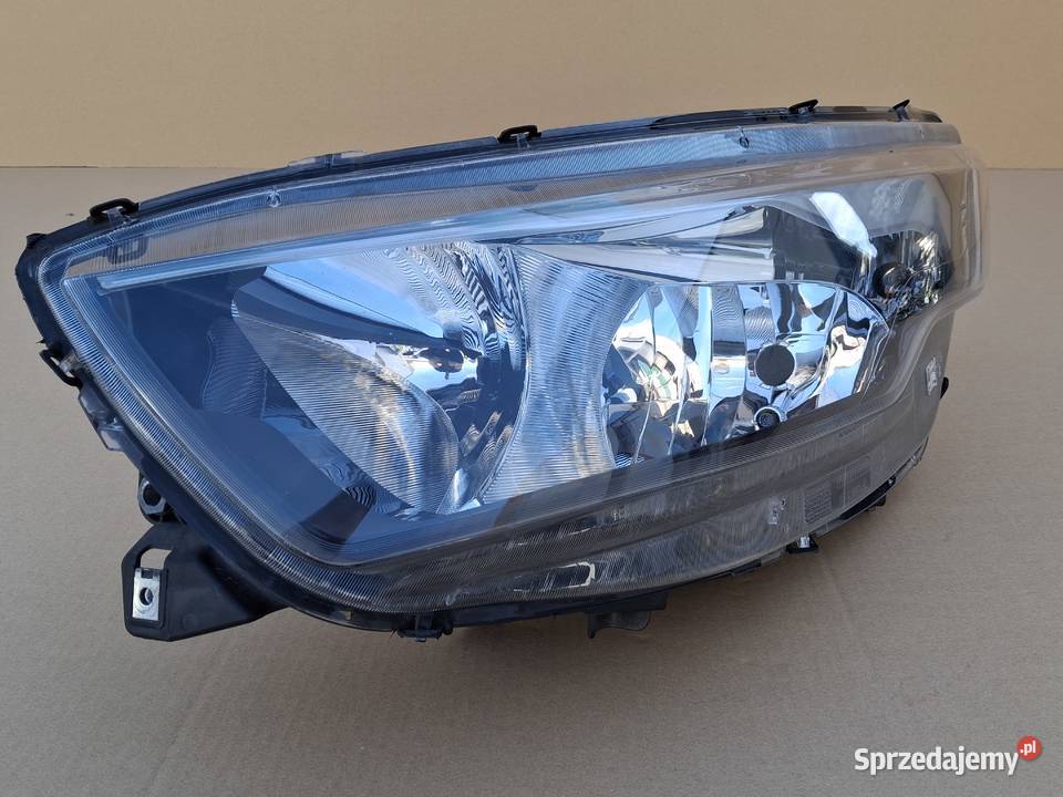 IVECO DAILY 14 REFLEKTOR LEWY ORYGINAŁ LAMPA Lampy przednie Bieleń