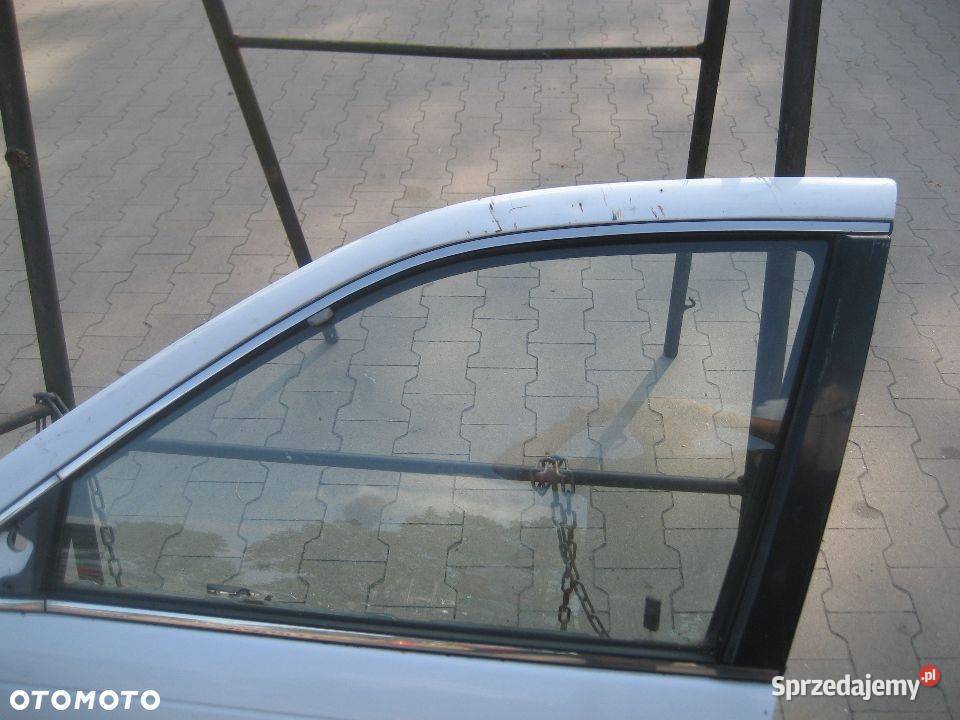 mitsubishi lancer 8891r drzwi przód lewe Rakoniewice