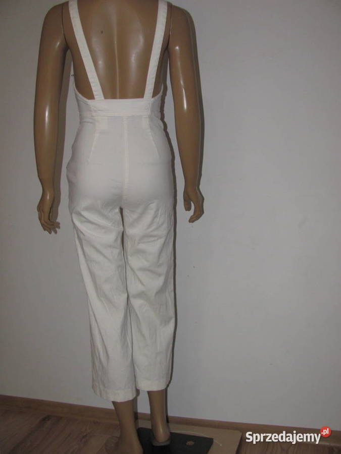 Kombinezon bez rękawów dzwony kremowe spodnie Zamość
