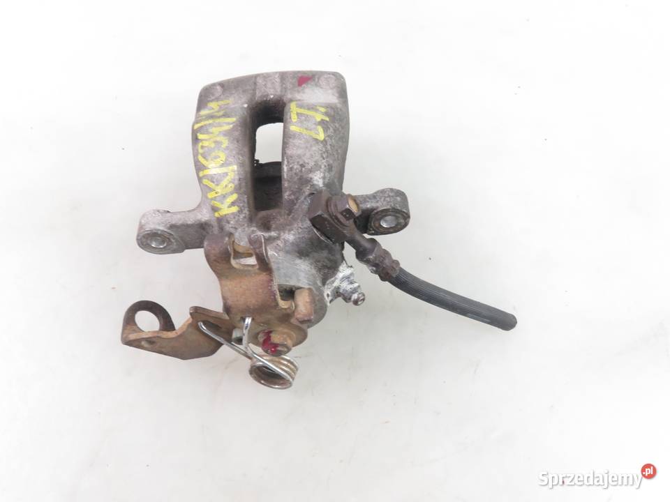 ZACISK LEWY TYŁ OPEL ASTRA III H GTC małopolskie sprzedam