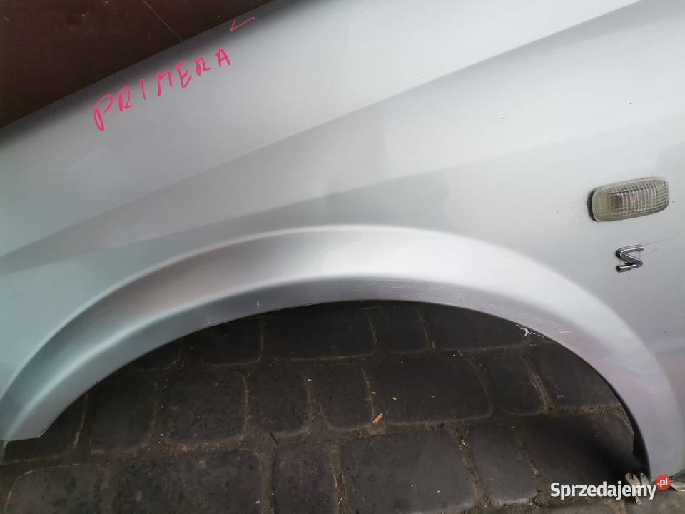 NISSAN PRIMERA P12 BŁOTNIK LEWY PRZEDNI KY0G Nowy Sącz