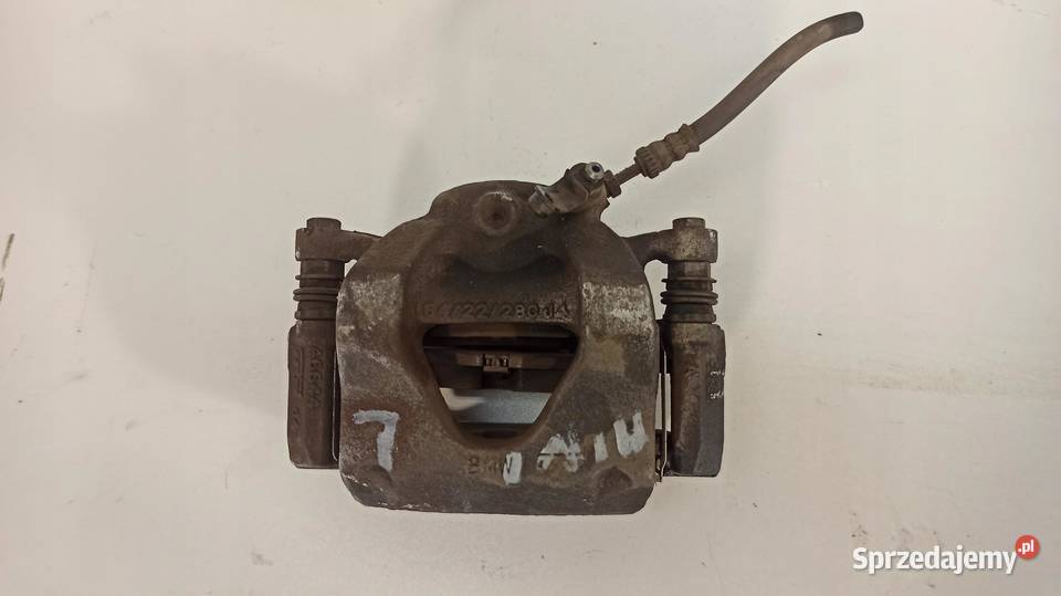 ZACISK 5422280 LEWY PRZÓD MINI F56 F55 F57 Części samochodowe