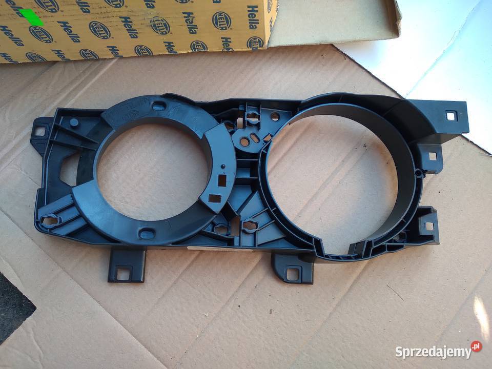 BMW E34 ramka stelaż lampy nowa HELLA 13174100 osobowe Strzelce Krajeńskie