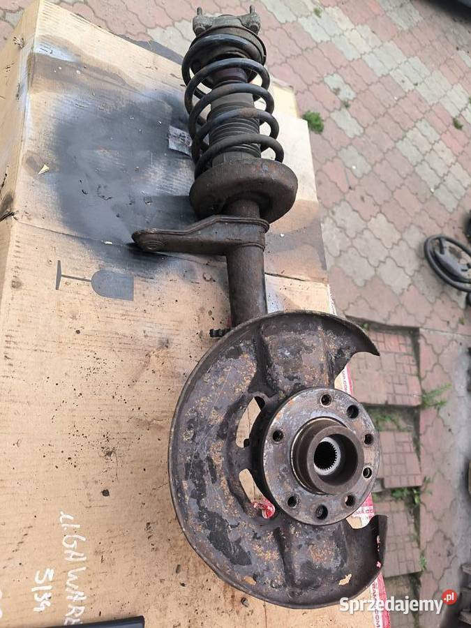 Saab 900 zwrotnica amortyzator zawieszenie prawa
