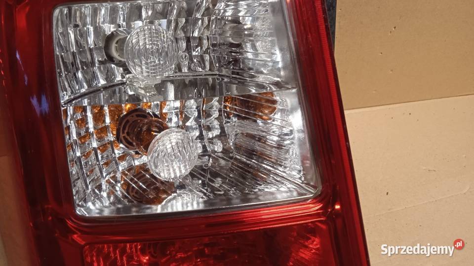 KIA CARENS III VAN LAMPA TYŁ LEWA Zbierkowo