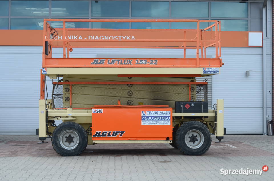 Podnośnik nożycowy JLG Liftlux 15322 240 podest Rok produkcji 2006 Motoryzacja Jasło
