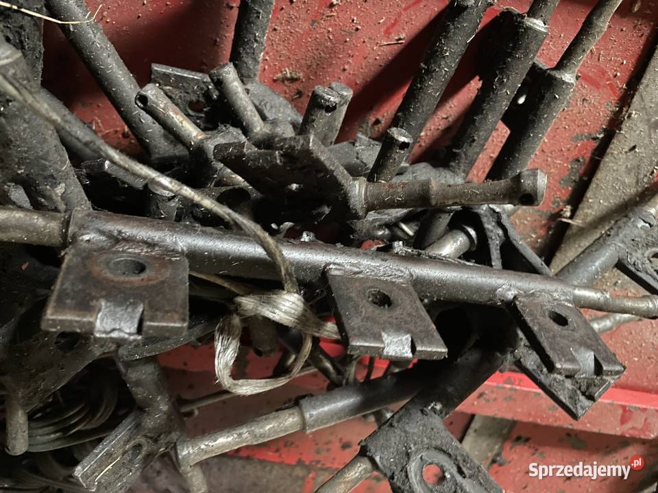 Sprzedam używane wieszaki zgrabiarki pasowej Pozostałe Górno