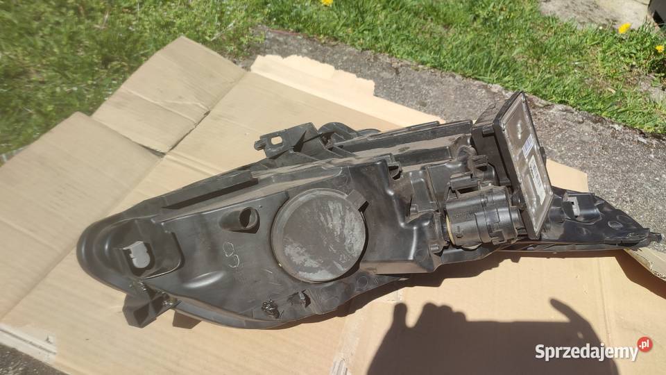 Lampa przednia lewa BMW e60 Hella 1el 009