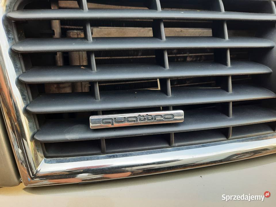 QUATTRO Znaczek emblemat na atrapę Audi A4 B6 osobowe Szczerbice