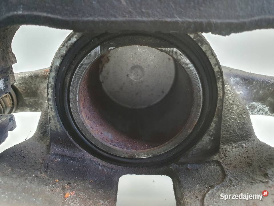 Toyota Corolla XII E21 PRZEDNI ZACISK HAMULCOWY Janów