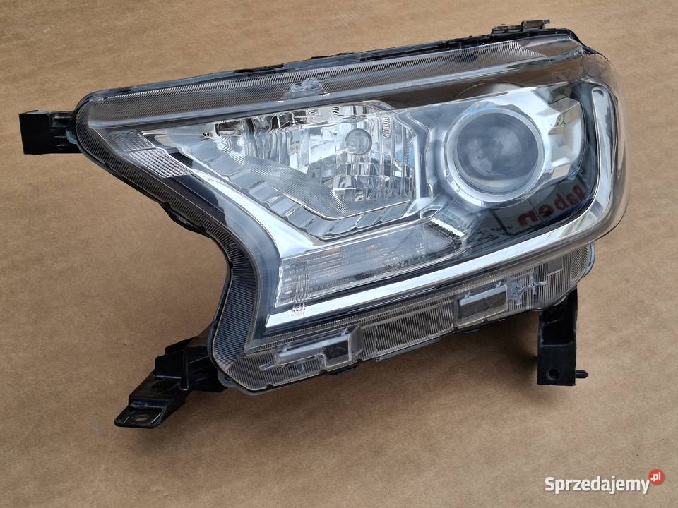 FORD RANGER III LIFT 15 REFLEKTOR LEWY HIR2 H15 osobowe Bieleń
