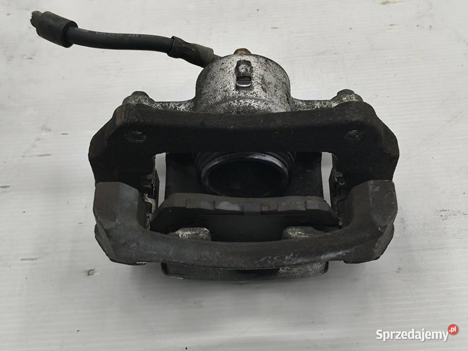 ZACISK LEWY PRZÓD FORD FIESTA MK7 LIFT 10
