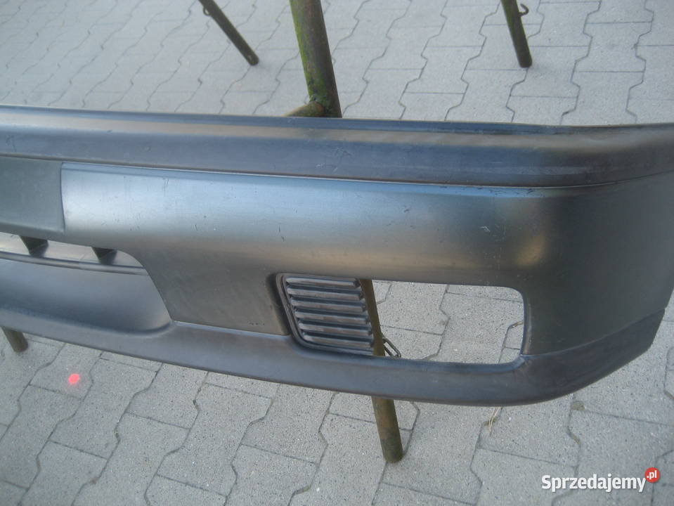 nissan primera p10 9094r zderzak przedni osobowe Zderzaki Rakoniewice sprzedam