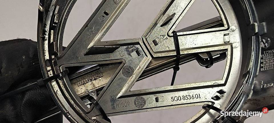 EMBLEMAT MASKI VOLKSWAGEN GOLF VII 5G0853343A Lipno