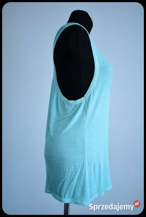 Miętowa bokserka mocno wycięta narzutka bluzka Płock