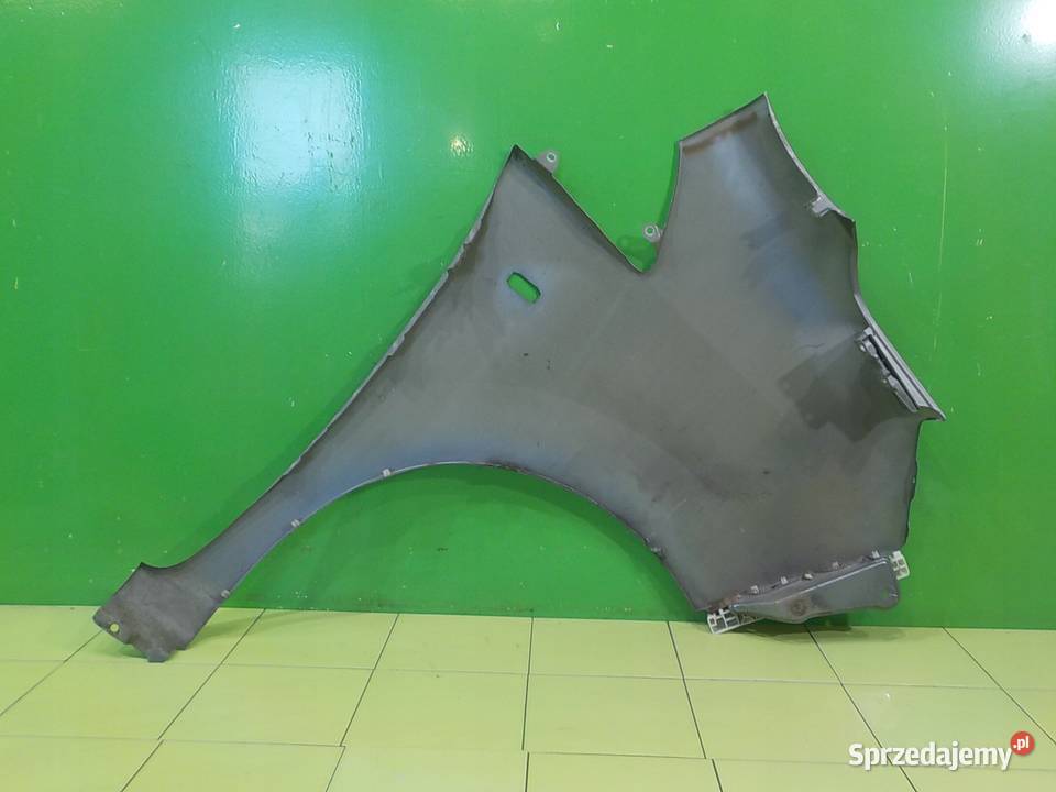 NISSAN NV200 15 DCI 11r VAN blotnik lewy przod Suków